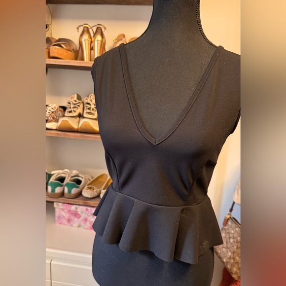 Elegant Black Peplum Dress - Picture 1 of 4